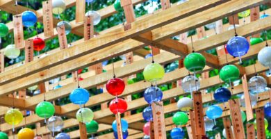 multi colored balloons on brown wooden rack