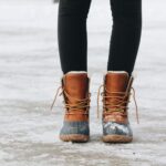 person standing on brown ground