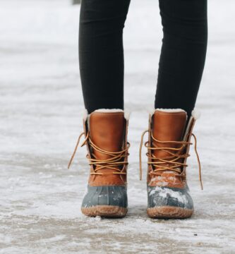 person standing on brown ground