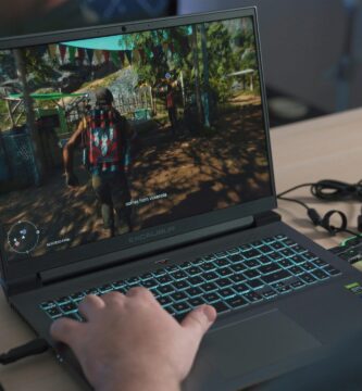a person playing a video game on a laptop