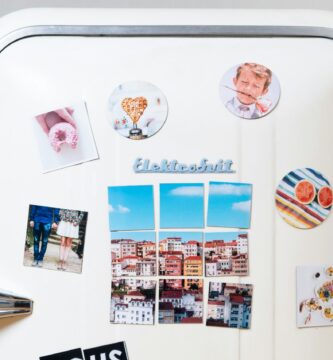 assorted-type photos stick on white single-door refrigerator