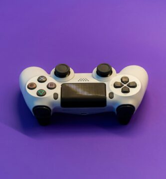 white and black game controller