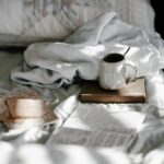 white and gray bed sheet