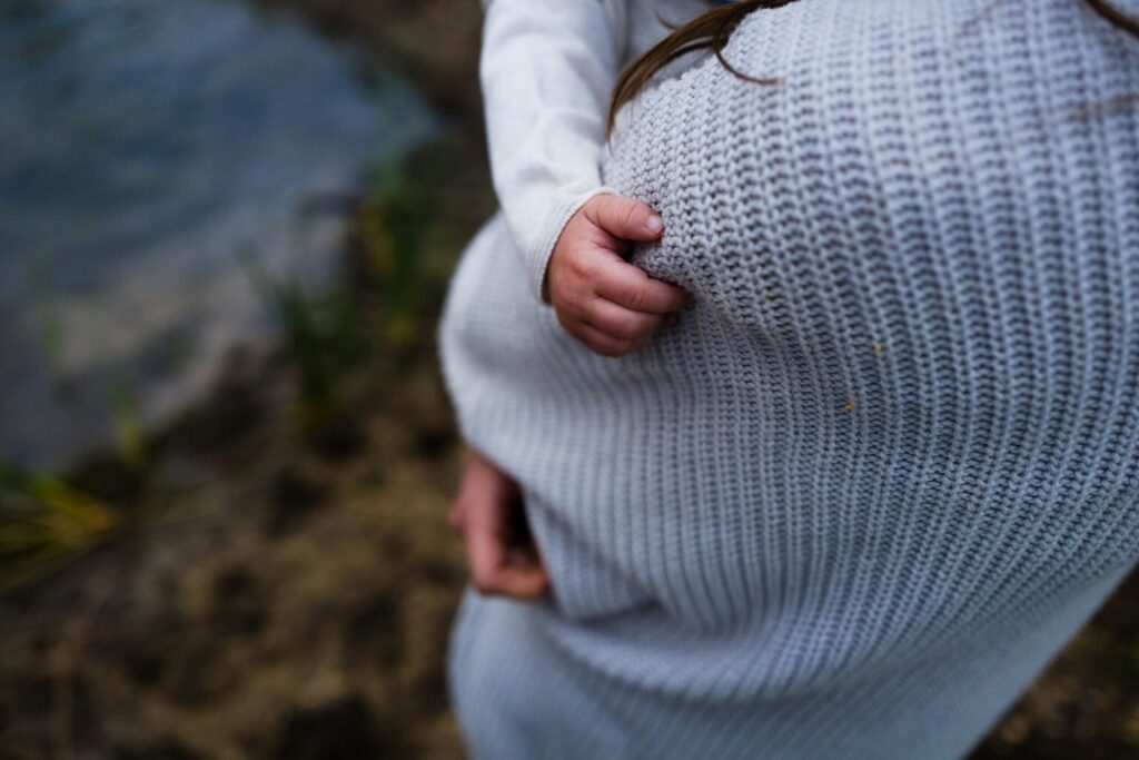 woman carrying baby