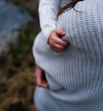 woman carrying baby
