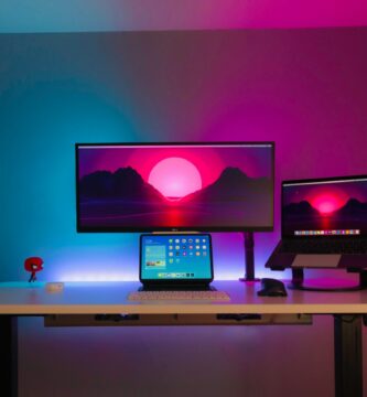 black flat screen computer monitor on brown wooden desk