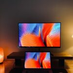macbook pro on brown wooden table